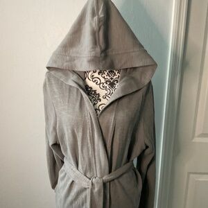 Hooded sweater with robe like belt and pockets